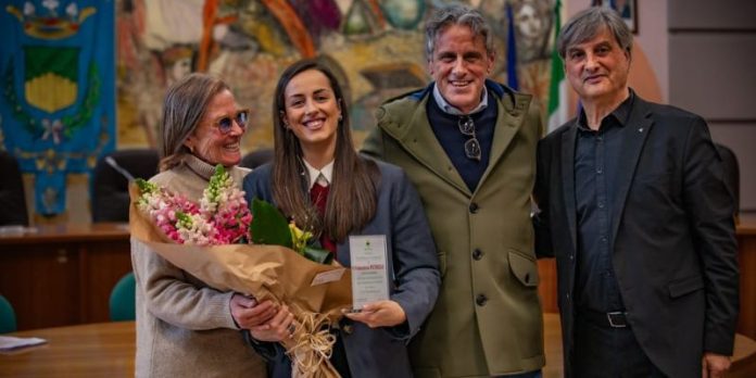 Francesca Petrolo con i genitori e Mimmo Frammartino